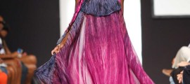 Jamaica's leading model, Jeneil Williams, floats down the runway in Kaj's bohemian lounge dress at CFW 2010 in Kingston, Jamaica. Photo courtesy Pulse Investments.