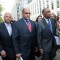 Guyanese-American State Senator John Sampson of Brooklyn Surrenders to FBI on Charges of Embezzlement and Obstruction of Justice Brooklyn State Senator John Sampson (center) and his attorney Zachary Carter (right) leave Brooklyn Federal Court on Monday