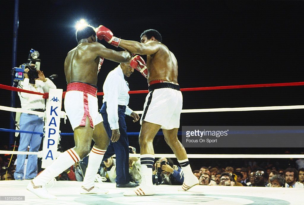 Trevor Berbick, left, exchanges punches with Mohammad Ali, right, during a heavyweight fight December 11, 1981 at the Queen Elizabeth Sports Centre in Nassau, Commonwealth of the Bahamas. Berbick won the fight in a ten round unanimous decision. (Photo by Focus on Sport/Getty Images)