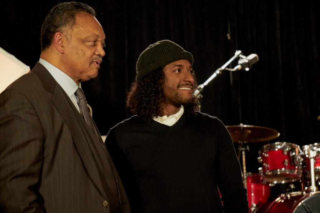Rev. Jackson with R&B singer Lloyd. PHOTO: Zeribamedia