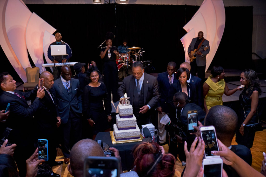 Jesse Jackson cuts his 75th birthday cake