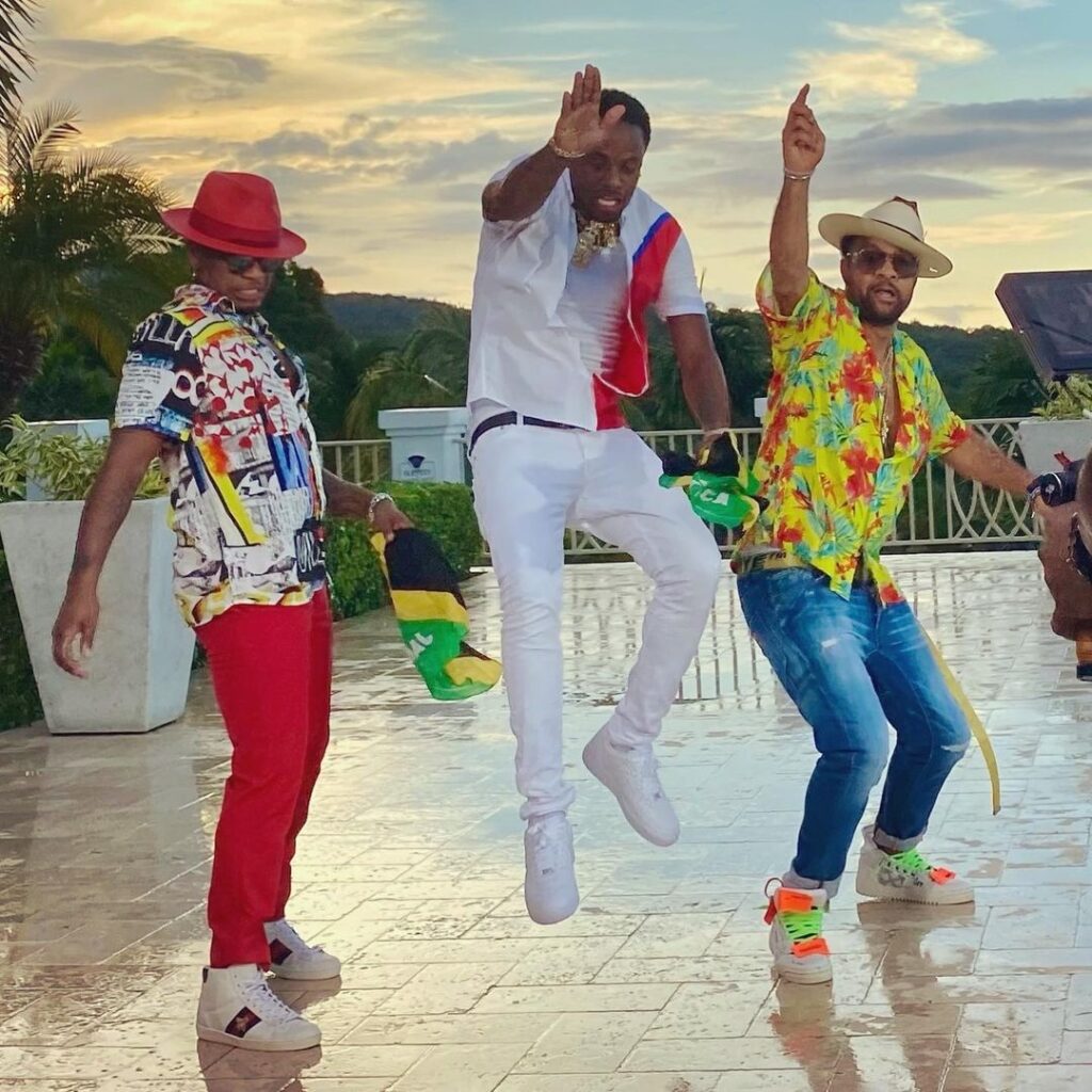 From left: Ne-Yo, Ding Dong and Shaggy on the set of the Holiday In Jamaica music video. (Photo: Instagram/Ding Dong)