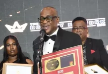 Grammy Certificates Recognize Legacy of Steely and Clevie Cleveland “Clevie” Browne of Steely and Clevie fame, shows off his gold plaque for co-producing You Don’t Love Me (No, No, No) by Dawn Penn. He is flanked by Steely’s daughter Shanice and his brother Danny Browne. Occasion was the Grammy Certificate Ceremony in Kingston on September 13. | Photo by Hopeton Walker
